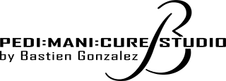 A black cat is leaping in mid-air against a white background. The cat's body is arched, with its hind legs stretched out behind and front legs extended forward, creating a dynamic silhouette. The cat's tail is also raised high, capturing a sense of movement and agility.